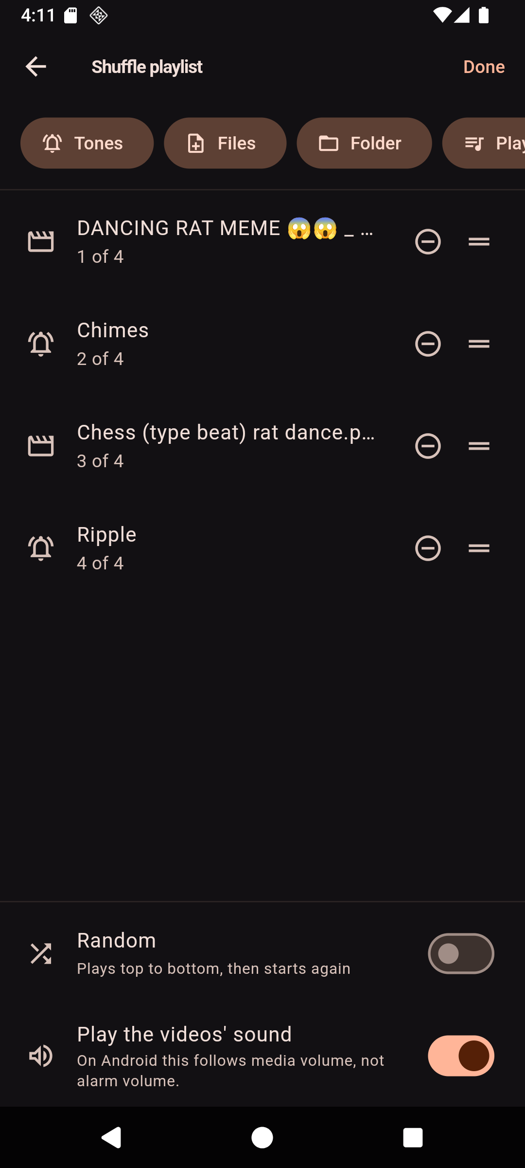 The shuffle playlist editor: source chips for Tones, Files, Folder and Playlist, then four entries numbered 1 to 4 — two videos and two tones — each with a drag handle, plus toggles for Random and for playing the videos' own sound.